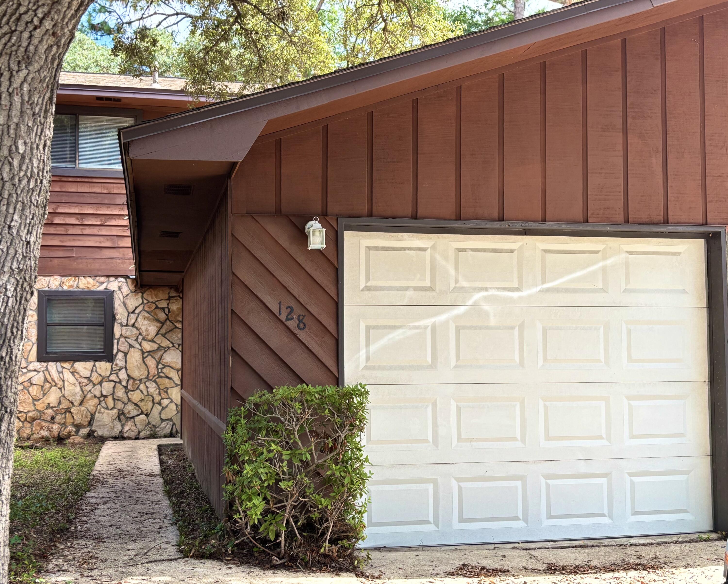 Step inside to discover a warm and welcoming living area centered around a cozy fireplace, ideal for creating memorable moments with loved ones. The seamless flow of the open floor plan enhances the home's airy ambiance, making it a delight for both relaxation and entertaining. Each bedroom is designed as a private retreat, offering ample space and natural light to inspire tranquility and comfort. The modern kitchen, outfitted with sleek finishes, invites culinary adventures and delightful gatherings. Outside, the charming surroundings of Shalimar provide a peaceful backdrop, while still being close to all the conveniences you desire. Owner will allow a small dog under 25lbs accepted with $350 pet deposit fee.  Residents are enrolled in the Coastal Realty Services Resident Benefits Package (RBP), which includes renters insurance, HVAC air filter delivery, a resident rewards program, and more!