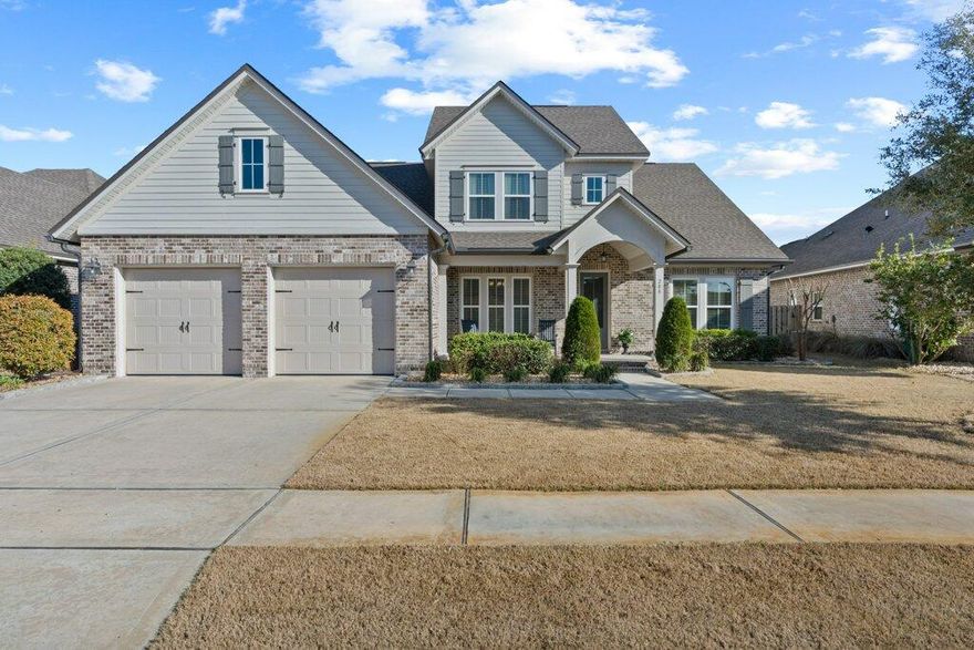 Beautiful 2 story home with workshop and huge screened porch built by Randy Wise Homes available now.  This home is a one of a kind in The Meadows at Hammock Bay.  Craftsman style architecture with great landscaping lets your buyer know right away that this home is special.  Backyard features a hot tub, workshop, paver patio and screened porch.  Wood floors throughout the first floor are beautiful.  Kitchen features large island and a huge stainless refrigerator and freezer.  Laundry room is oversized and features built in cabinetry and desk area.  Master suite has separate shower and oversized tub with 2 separate closets.  Secondary bedrooms all have oversized closets - lots of storage throughout.  This home is in fantastic condition - its a must see for your clients. Other additional features included are built ins for master closets, frameless glass door for secondary bathroom, pavers in front yard for side walk, additional cabinets in bathrooms, roof extension on rear screened patio, additional shelving in kitchen pantry, barn doors for master closets, additional shelving in office closet, uv whole house purifier on hvac
