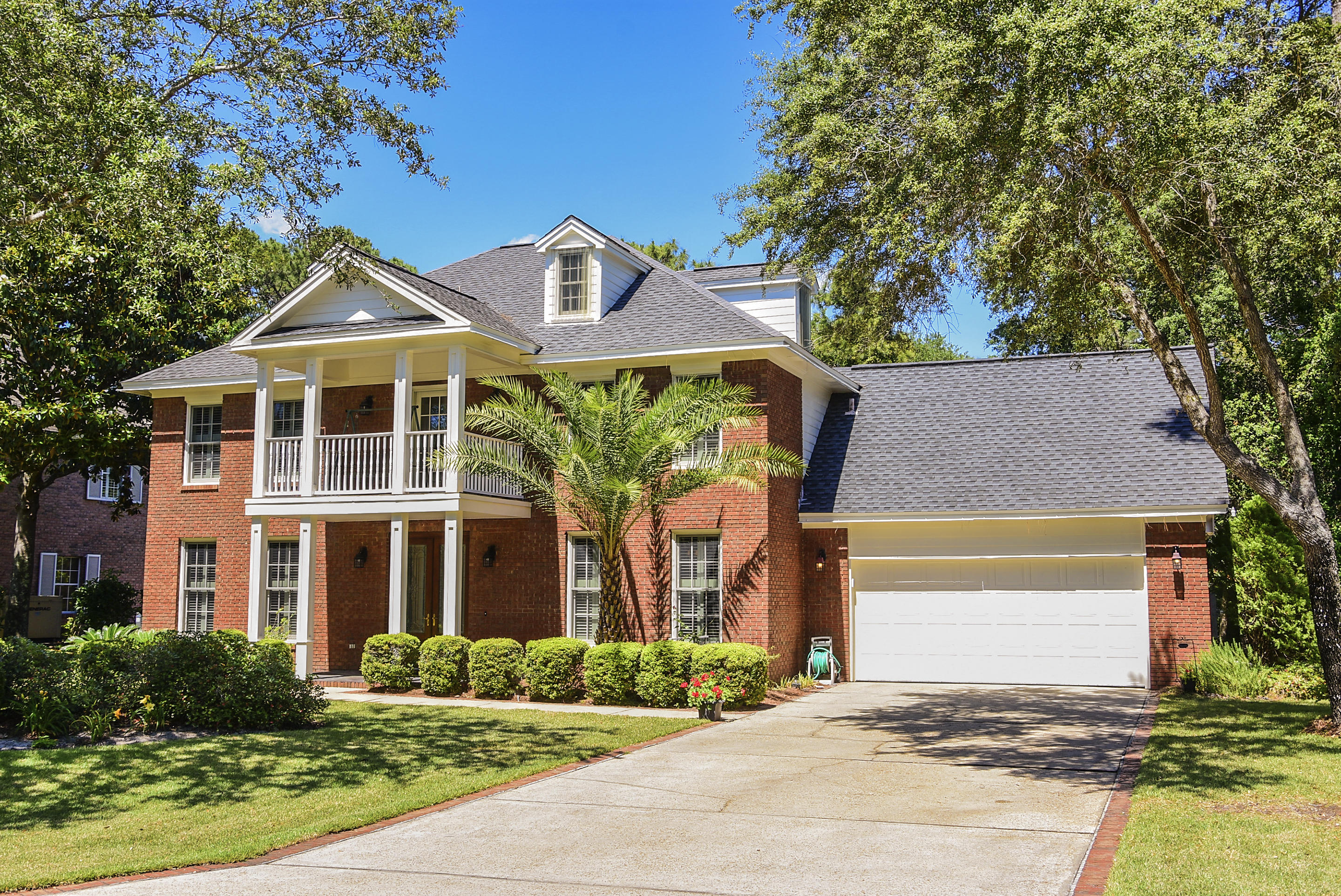 Stately Southern Colonial exudes curb appeal from its lower and upper covered porches with stately columns to it's welcome home appeal of the custom 9 ft. mahogany doors with leaded glass and zinc caning. Picture yourself enjoying a cool glass of ice tea on the swing from the upper balcony which boasts waterfront views of the Choctawhatchee Bay. Inviting and spacious hardwood-floored foyer gives a picturesque view through double French doors to the 15' by 36' caged pool and private backyard. Pool resurfaced with Crystal Krete (2012). Hardwood floored formal dining room and study greet you on either side of the foyer so this custom-built beauty flows comfortably. Dining room also features plate rack, wainscoting crown molding and wide baseboards all adding to its colonial charm Study/office also features twin closets, birch-paneled wainscoting, and upper custom-shelving perfect for the avid reader and access to the powder room complete with shower. Study/office could easily be a downstairs master. Upgraded kitchen (2014) features white cabinets with light granite counters, stainless steel appliances, slate floor and breakfast nook with bay window. Relaxing family room boasts Chicago brick fireplace with gas logs and custom surround with mantle, elongated wood-look, white tile floors, and transom windows. Pool view from kitchen and family room.
Hardwood floored steps lead to hardwood floored major walk-walk ways up, so neutral carpeting in upstairs bedrooms only (new). Master suite features his and hers closets, double sinks, relaxing tub and king-size shower with seamless shower door (remodeled in 2014 ). 3rd and 4th bedrooms enjoy a "Jack and Jill" bath plus a walk-in closet. Excellent storage through-out. And don't miss the 3rd level which can be utilized as an exercise area, kids' domain, media room or library/reading room. This level features dormer windows with plastic hurricane shutters (labeled plywood hurricane shutters also for whole house).
This classic colonial charmer features JELD-WEN Pozzi windows (2005), plantation window coverings throughout, 50-year dimensional shingle (2006),and 3 zone heating and cooling system (air handler replaced in 2016, outside unit in 2014). Insulated 2-car garage. Pool heater is "as is" condition, Seller has never used. You will love the short walk to Windward's private beach and enjoy the exquisite sunsets. Timeless design inside and out within the gated community of Windward! Please call today for a private viewing of this home!