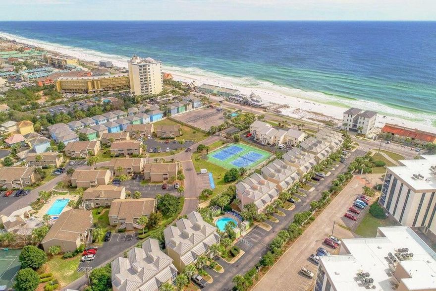 Qualified buyers can purchase for 10% down and VA approved! Welcome to your new Destin property, where Gulf Views await from your 3rd floor private balcony! It's currently the BEST priced 3-bedroom townhome along the beach. This stunning 3-story townhome offers modern amenities and architectural character, with multiple balconies for soaking in the scenery. Your gated/private beach access is just steps from your door. Inside, an oversized master bedroom with raised ceilings and private balcony awaits. The kitchen boasts stainless steel appliances, granite countertops, and a beautiful backsplash.  BONUS- a 2nd master bedroom located on the 1st floor. The HOA covers private beach access, heated pool, tropical cabana, landscaping, and more. Don't forget the garage for your car or golf cart. Discover the luxurious Beach Pointe community of townhomes, just steps from gated beach access in Destin! Enjoy the centrally located, fenced-in community pool and sun deck. Within a short distance, find beachfront restaurants and attractions like Destin Commons and Silver Sands. Families return year after year for the ultimate vacation experience.

Interior layout - 1st Floor - Bonus Master Suite w/ King Bed and private entrance to 1st floor back sun patio/deck. Washer and dryer located in foyer of the 1st floor. Entrance to garage located near foyer. 2nd Floor:
Guest/Kid's Bunk room: 2 Twin Bunkbeds (sleeps 4+)
Living Room: Sleeper Sofa
3rd Floor: Deluxe Master Suite with Wet Bar, King Bed w/ private entrance to oversized 3rd floor private balcony.


Explore Destin Commons, offering a pedestrian-friendly environment with interactive water fountains and a nautical-themed outdoor playground. With over 75 shops and restaurants, including Godiva Chocolates and Bass Pro Shop, there's something for everyone. Don't miss the AMC Movie Theaters and the mini-train for the kids!