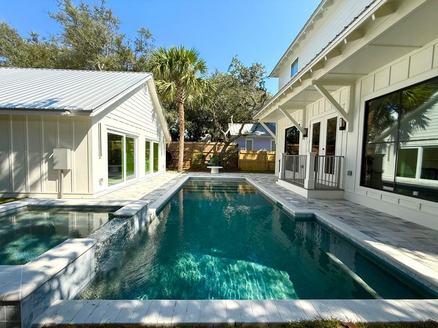 Brand-New Coastal Luxury | Estimated Completion: October 2025. Rental Projections $200k+/Year! Welcome to your dream beach retreat in the heart of Kokomo Kove, nestled within the highly desirable Crystal Beach neighborhood of Destin, Florida. This fully furnished, custom-built home offers the ultimate in coastal living with private, deeded beach access--plus you're just two blocks from 340 feet of newly acquired public beach access.Boasting 6 spacious bedrooms and 5 full bathrooms, this thoughtfully designed residence is perfect for entertaining or relaxing in style. The open-concept layout flows effortlessly from the main living area to a private backyard oasis, complete with a sparkling saltwater pool and spa, perfect for enjoying the Florida sunshine year-round. The main level features two generously sized bedrooms, including one of with an en-suite bathroom ideal for guests or multigenerational living.

The gourmet kitchen features elegant quartz countertops, shaker-style cabinets, stainless steel appliances and flows into a bright and airy living and dining area. Two oversized 6' x 8' windows flood the space with natural light and offer beautiful views of the pool and backyard.

Upstairs, you'll find four additional bedrooms, including a fun bunk room designed with built-ins perfect for kids or vacation rental appeal.
Step outside and indulge in resort-style living. The luxurious saltwater pool and spa are enhanced with OmniLogic smartphone automation, allowing you to control the settings with a tap. The detached pool house/cabana adds even more versatility, featuring a stylish bar area, half bathroom, and an outdoor shower for added convenience after a day at the beach.

Whether you're looking for a primary residence, a vacation getaway, or high-performing investment property, this exceptional home offers the perfect blend of modern comfort with timeless beach charm right in one of Destin's most coveted communities.