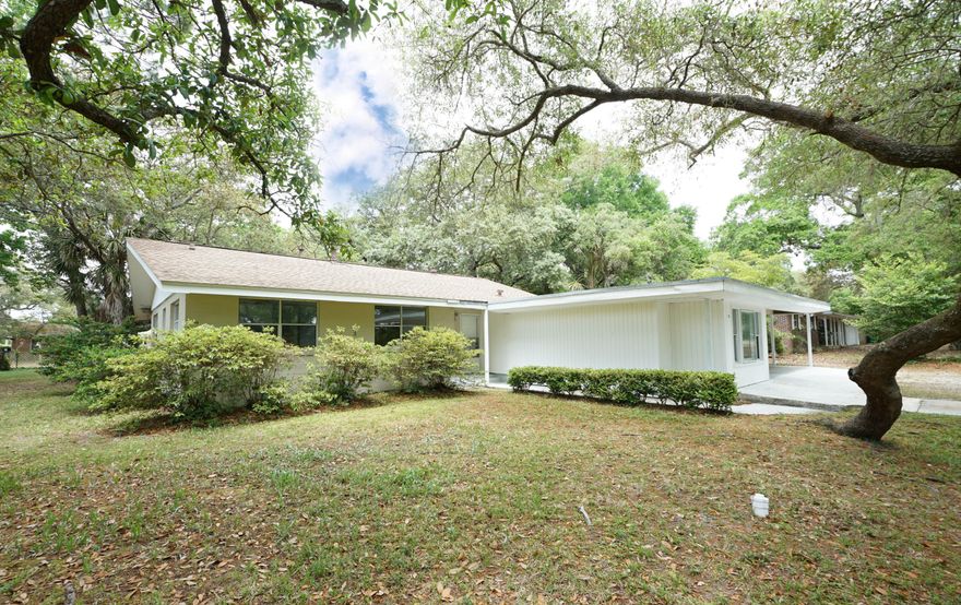 Location, location, location! This 4 bedroom and 2.0 bath Shalimar, FL home is Just around the corner from shopping, military bases, and hospital. The home is also across the street from the Bay and public beach access on the street. The home has 2056 sq ft and is located on a huge corner lot with beautiful, mature vegetation! Plenty of room to park boat trailer, RV, or multiple vehicles. Two living rooms, dining room, split floor plan, extra bonus room and huge back yard!! New LVP flooring, newly painted, very well maintained! Pets allowed / restrictions apply. Good credit and rental history,  good background check, non smoking. Tenant pays utilities, internet, and pest treatment. 12 month lease! The home is getting new LVP flooring, removal of popcorn and fresh coat of paint! There is a galley kitchen, living room, extra family room/den or home office, bedrooms and bathrooms, and dining room!! There is a split floor plan with the mother in law area next to the dining room & the other bedrooms on the other side of the home!! Great for multi - generational families. 

There is a separate laundry room adjacent to the two car carport, fenced in yard, and an open patio in the back yard. Bring the Paddle Board because there is Beach access across the road!

Renter to verify the dimensions and information.
