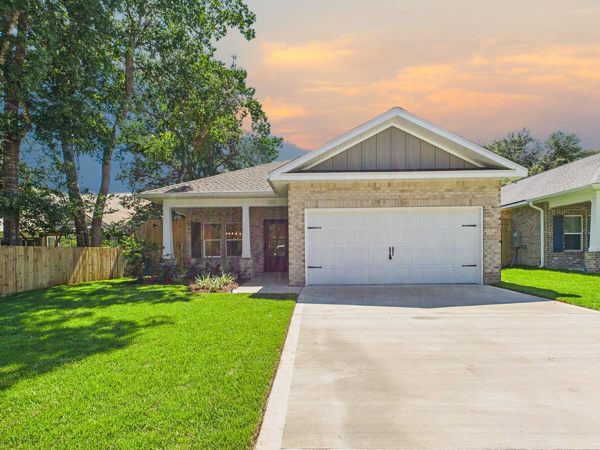 Grand American Homes is celebrating the 4th of July with a special limited-time offer for buyers. The builder is covering 2% of the buyer's closing costs, plus doc stamps, title fees, and the final survey. A fence and refrigerator are also included, and buyers can choose from multiple blind options to customize their new home.In addition, upon successful close of escrow, the builder will provide a 4th of July Party Pack that includes a Yeti Haul Cooler, Blackstone Grill, red, white, and blue cornhole boards, and a $100 Walmart gift card.If the buyer prefers, they may choose an additional $1,000 toward closing costs or a rate buy-down instead of receiving the party pack.Buyer must be under contract by July 4th and close by July 31st to qualify. Contact us today for details. Welcome to 1575 Pine Street, a beautifully crafted new construction home in Niceville, Florida. Designed for both comfort and style, this 4-bedroom, 2.5-bathroom home offers 2,123 sq. ft. of well-planned living space. The kitchen is a standout, featuring Quartz countertops, a ceramic tile backsplash, double-edge shaker cabinetry, and sleek stainless steel appliances. Throughout the home, LVP flooring provides both durability and elegance, while matte black hardware and modern finishes enhance the design. Energy efficiency is key, with natural gas fueling the heat, cooking range, dryer hookup, and tankless water heater, keeping utility costs lower. Additional conveniences include a privacy fence, blinds, and a refrigerator. Cabinets, countertops, and flooring are going in now - come check out these amazing finishes! Builder can close by 6/30. Photos shown are of a similar home by the same builder; final details may vary. Don't miss out on this fantastic opportunity!