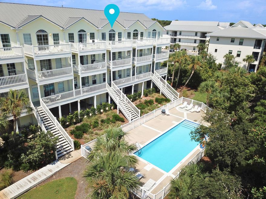 Hear the Gulf waves at this fully furnished 30A townhome near Gulf Place, just 400 yards to the beach! Enjoy Gulf views, TWO pools, a hot tub, volleyball, and tennis! Sleeps 12 in four large ensuite bedrooms (2 king master suites with private decks, 2 bedrooms with 2 full beds each). Relax in the spacious kitchen, living/dining area, plus half bath. Step out to the covered porch with stairs down to the boardwalk for easy pool access. Keyless entry, motion-lit parking for 2 cars plus overflow. Lush landscaping creates a resort-like feel. Rental Ready with 5 smart TVs, cable, 2 DVD players, and a gas grill near the pools. Close to Santa Rosa Golf Club, shops, dining, kayaking, and the 19-mile bike path. Easy beach access! Schedule your showing today and see the beach for yourself!