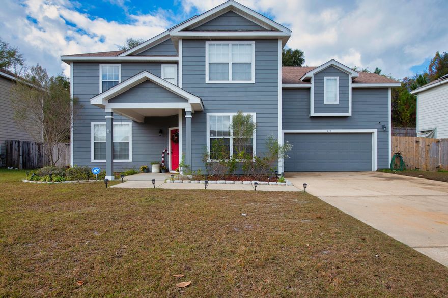 Kick your shoes off and relax in this beautifully updated 2 story home. The kids can each choose from the 3 bedrooms, while mom and dad enjoy the luxury of their master bedroom and bath suite. This home offers an upstairs laundry conveniently located between all bedrooms. Hardwood vinyl plank flooring on lower level with carpeting throughout second floor. Fenced back yard. Located in a sought after Sandy Ridge neighborhood located SOUTH of I-10 with easy access to Eglin AFB. New 2022 HVAC system, with transferable 10 year warranty.  This home has so much to offer!