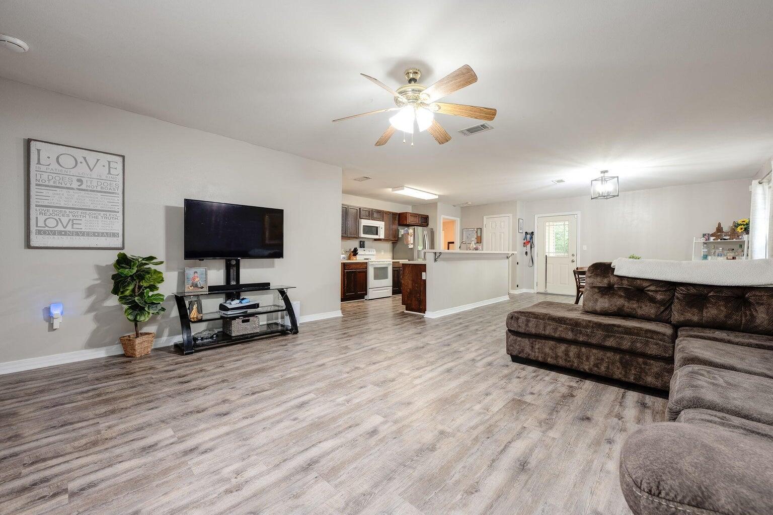 This pet-friendly rental offers comfort and convenience with new hard floors in the main living area and like-new carpet in the bedrooms. You'll love the open kitchen that flows seamlessly into a spacious living room, perfect for entertaining or relaxing after a long day. Step outside to enjoy the covered back patio, fenced backyard, and a shed for extra storage.Centrally located--just 30 minutes to Eglin, 20 minutes to Duke, and 10 minutes to the interstate--this home offers easy access for commuters and adventurers alike.
