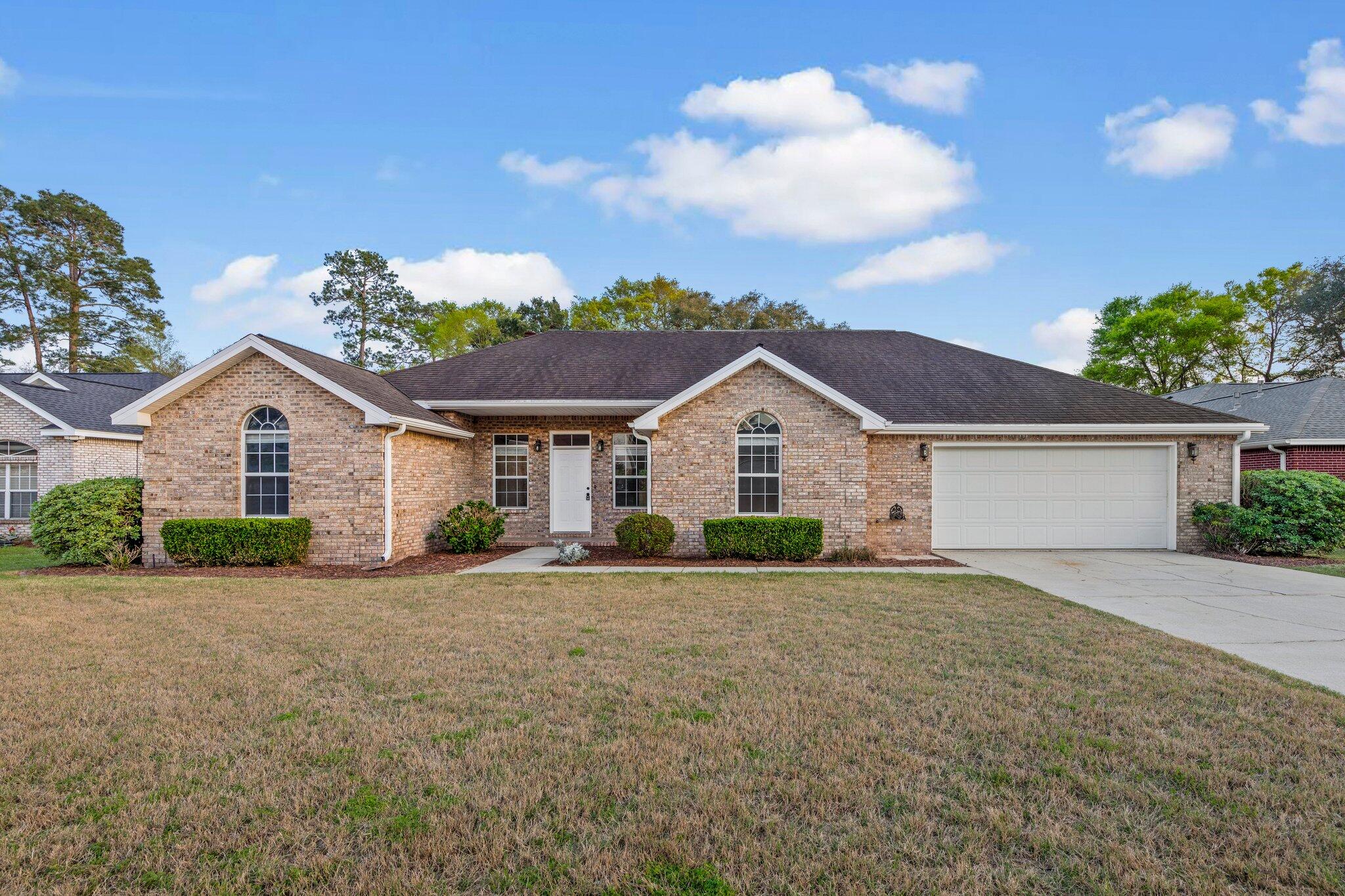 Located in the desirable neighborhood of Huntington in Rocky Bayou, you will want to see this great single story 3 bedroom/2 bath brick home & 2 car garage. This home features an open floor plan and vaulted ceilings in the family room. Beautiful custom built-ins and wood burning fire place are a few of the focal points of this home. To the left after entering the home, are 2 bedrooms and a full bathroom located in the hallway which features a double vanity. The kitchen, overlooking the family room has been updated with granite counter-tops, beautiful cabinetry & newer kitchen appliances. Off the kitchen is a large formal dining room area which also opens back up to the family room, making entertaining easy! The Master bedroom is very spacious and has ample wall space. The master bathroom