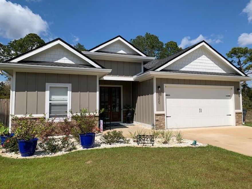 Desirable location in Navarre. The beautiful white sand beaches of the Gulf of Mexico are your backyard. This is a great flowing, elegant looking Craftsman style house with 4 bedrooms and 2.5 bath.  Double entry stained wood doors with beveled glass greet you when you walk up to the house. Nice sized kitchen with ample storage to include stainless hood vent, soft close drawers and cabinets. Quartz counter-tops. Walk in pantry. Laundry area with utility sink. Open concept living with recessed lighting and remote controlled light fixtures in most every room. LVP throughout the house. Pull down Levolor blinds in all rooms as well. NO HOA, level lot with privacy fence. 10X20 shed. Well pump and Rainbird sprinkler system and Nest thermostat. Rain gutters. Public water.