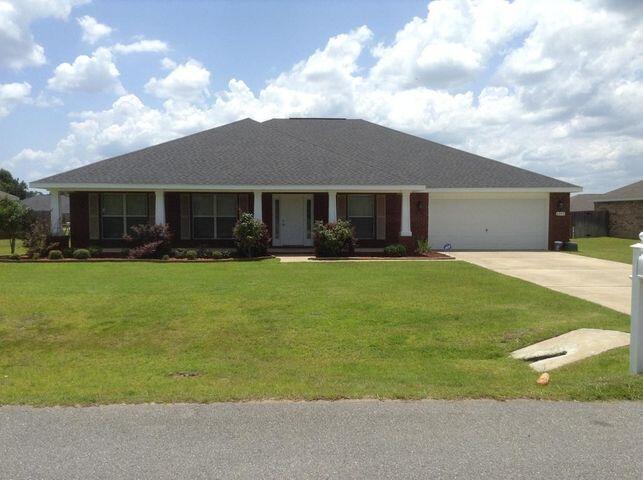 A Must See! This spacious 4 bed home with 3 baths is just right for a large family. This modern Ranch floor plan features a huge living room, dining room, office and a spectacular kitchen, Stainless steel range, microwave and dishwasher; Granite counter tops and large island. Master Suite separate side of the home has a large walk-in closet and an additional closet . There is a large covered porch off the great room perfect for relaxing or outdoor entertaining. In addition, Elementary, middle, and high school located within 5 to 7 miles. Special features; custom shelving, tray ceilings, high ceilings, washer and dryer, pendant lighting. 7SFG(A) and Duke Field 16 miles. Located in Brownstone E. Manor Subdivision!