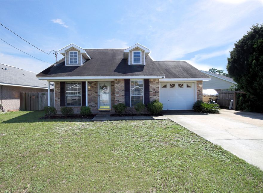 Home Sweet Home! 2017 NEW ROOF COMING SOON included! Ready for its New Owners This is a great floor plan...with two bedrooms on the first level and the Master Suite takes up the entire 2nd Level with Sitting area and nice Master Bath with Garden Tub. The vaulted ceiling in the living room gives a spacious feel and the kitchen opens to the living area -- has an eat-in kitchen and breakfast bar. The yard is good sized and fenced. Excellent purchase in an area of more expensive homes. Open Floorplan design with attached one-car garage.