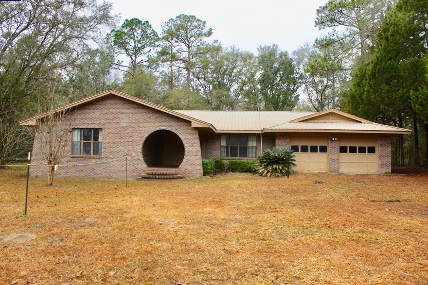 Check out this home on land that has 3 bedrooms and 2 full baths and a half. This home has a wood burning fireplace and has had one owner. This home was custom built to the owners liking. If you are looking for land and some space to spread look no further. There is a total of 8.7 acre's with additional 6 acre's. The seller is selling 4.35 with the house but the additional can be sold. If buyer is interested in anymore land let me know what and will talk to seller about price. Come take a tour and you won't be disappointed.