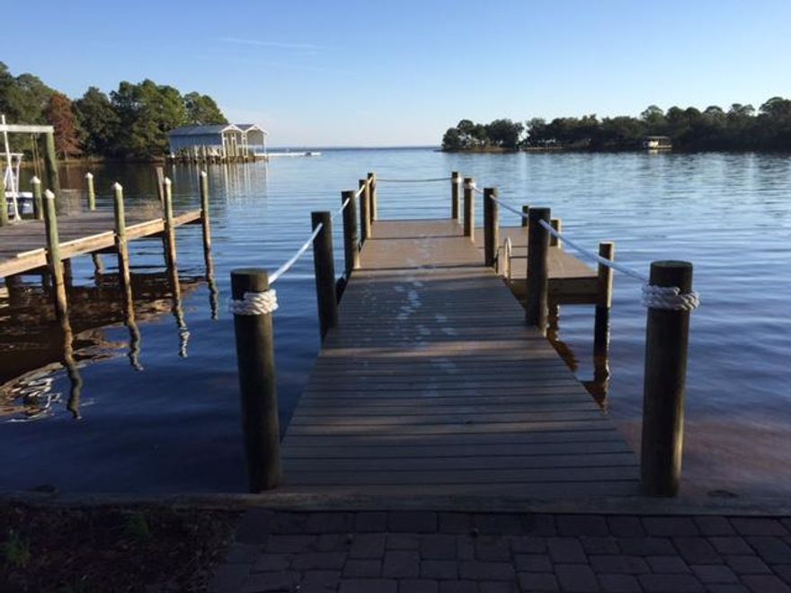 43 Lots in Santa Rosa Beach FL - Development opportunity. All infrastructure is in place. Water, Sewer, Cable, Gas, Electric, and internet installed and in place. Water and Sewer Tap fees are due on each lot. Sacred Oaks is a Waterfront community located on Mack Bayou. This is a Bulk Sale Price and does not reflect individual lot pricing.