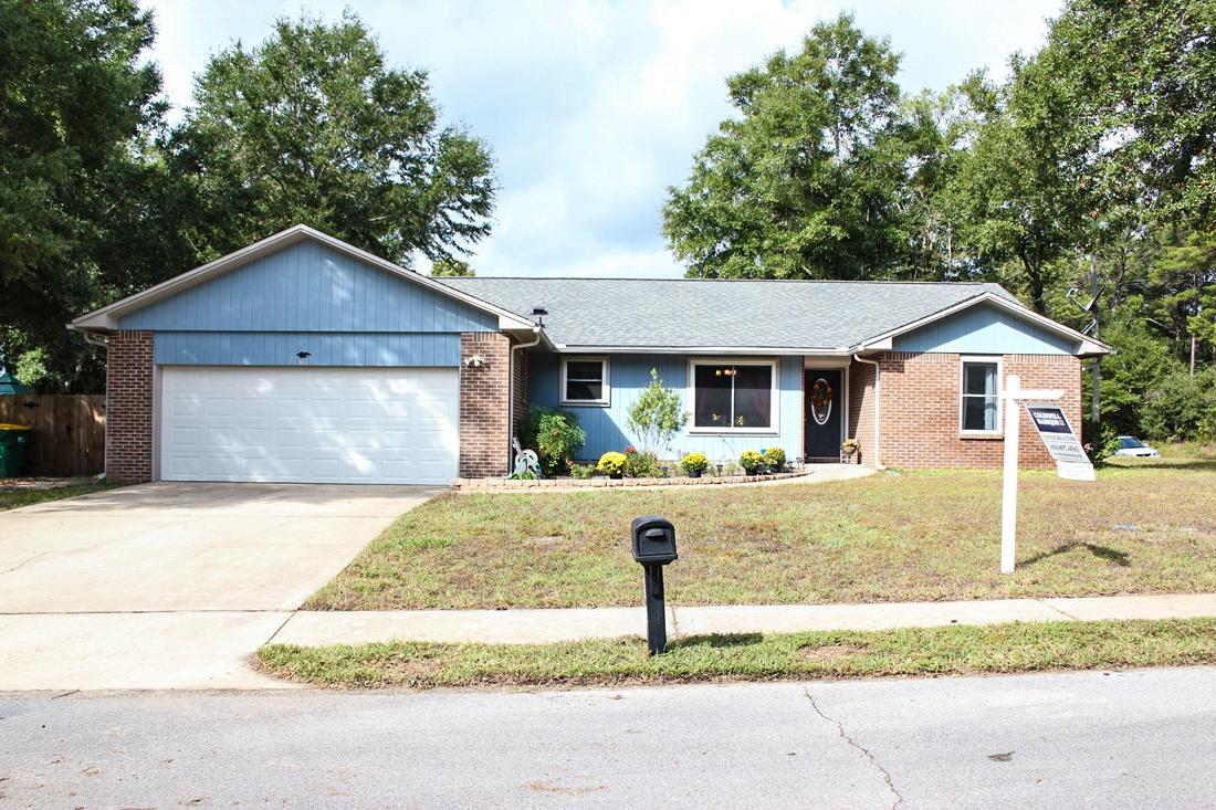 Looking for a great updated family home in the heart of Niceville? Then come check out this lovely split bedroom home on a corner lot on a street that ends in a cul-de-sac. The two things these owners loved about this home when they purchased it was the master suite and the quiet neighborhoodthey even say they would love to take all their neighbors with them!! The owners have been busy over the 3 years updating this home with features such as a beautiful large kitchen with granite counter tops, mosaic tile backsplash and new appliances including a