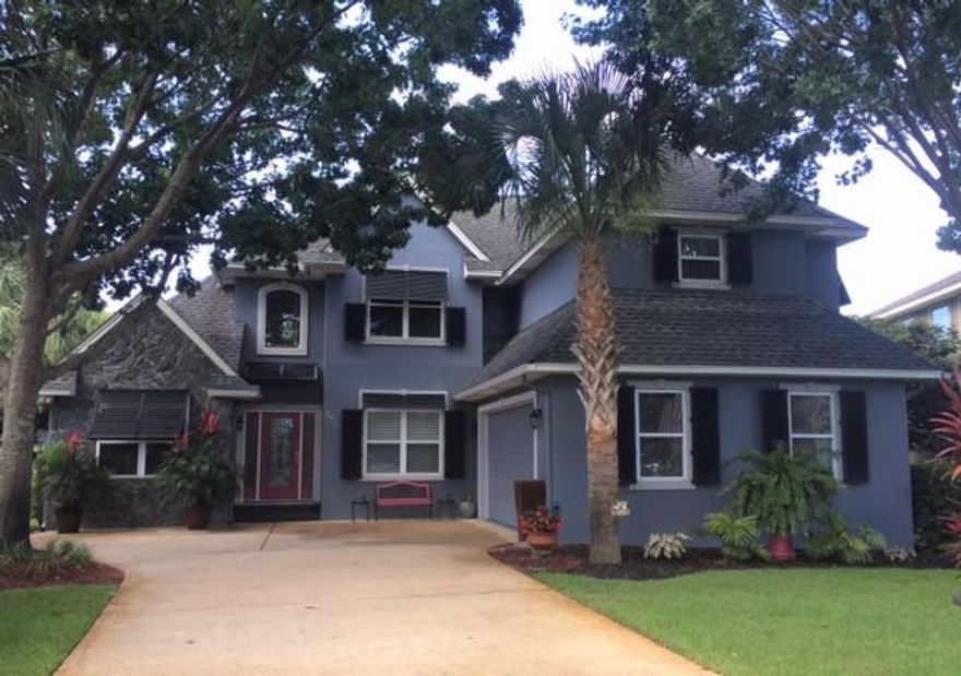 NEW PRICE! THIS IS THE LOWEST SQUARE FOOT priced CUSTOM Lakefront home in the gated community of Emerald Lakes in Destin, Florida!!! The kitchen features fabulous thick cut bordeaux granite counter tops, and stainless steel appliances. The breakfast room is surrounded by windows that create a light and bright atmosphere. The great room has vaulted ceilings, hard wood floors, built-in bookcases, and a gas fireplace. The master ensuite is on the first floor and is large enough to accommodate a king size bedroom set and sitting area. The master bath has a huge walk-in closet, separate shower, double vanities and garden tub. This property has been well maintained. Hurricane shutters convey. The neighborhood has a pool, tennis court & picnic area. This home is near the beach, shopping, dining a Much Much More!!! The Custom storm/hurricane/security shutters cover the entire home. The seller was a previous owner of a shutter company and is an expert on custom shutters.  The shutters even cover  the over-sized garage door and the screened in porch.  Most home shutters don't include this extra coverage. The attention to detail on the home shutters, sets this home apart from other similar homes in the area.  The shutters offer additional securtiy protection for the home owner that may travel a lot and wants their home to have an iron clad security shutter system. 

Pride of ownership is evident in this well maintained home that is keyhole ready for a buyer. This home was awarded a certicate of being a good sense home. 

For the fishing enthusiast, the area has many charter boats at the Destin harbor. For the golfer, there are many public courses close to this home.  

Destin is known for the wonderful dining options that are available. Locals and tourist alike enjoy the many festivals during the year. At the harbor you can view the fish that the charter boats brought in for the day.  The fishing rodeo is a popular event in Destin. For the wine lovers, there are several places that host wine festivals and tastings. For the boat lovers, there are many public boat launch areas so everyone can enjoy the boating lifestyle. There is so much to do in Destin and that is why we want you to come and see our little paradise!!!  
Buyer to verify all lot and home dimensions. This home is a MUST TO SEE!!!