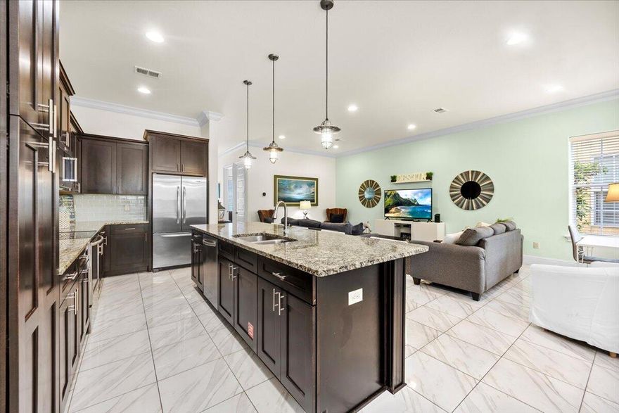 936 Scenic Gulf Dr Unit A, Miramar Beach, FLJust 500 feet from deeded beach access, this updated 4 bed, 4 bath townhome in Miramar Beach offers the perfect blend of space and coastal comfort. The first floor features a spacious living area with oversized tile flooring, a modern kitchen with granite countertops and stainless steel appliances, plus a large bedroom and full bath. The private patio provides a quiet retreat after beach days. Upstairs, the primary suite includes a large ensuite, and two additional bedrooms each have their own full bathrooms. Ideal as a primary residence, second home, or vacation rental.