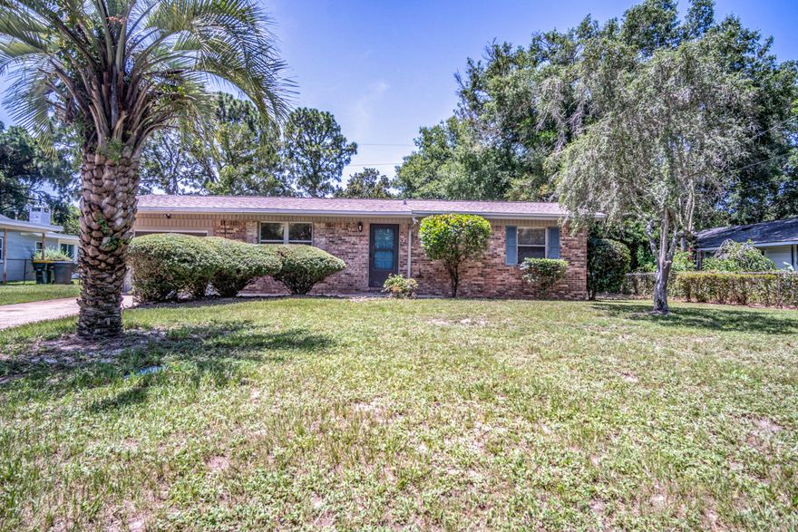Under current appraisal! Ideal Location, situated in FWB, this 3 bedroom 2 bath home has all the energy saving updates-New Roof (with second water barrier in 2018), double pane windows, and HVAC unit (2013) and copper wiring. This home will enchant you as you walk into the living room with wood flooring. All the walls and trim have been recently painted neutral colors throughout. This is a split floor plan with two bedrooms with carpet and ceiling fans and a full bath. The master bedroom is large and features carpet, ceiling fan, walk in closet, and full bath. The kitchen boasts dishwasher, electric stove/oven, and side by side fridge.There is a LARGE bonus room/family room to spread out and enjoy your new home. Step outside and relax under the covered porch overlooking the fenced yard.
