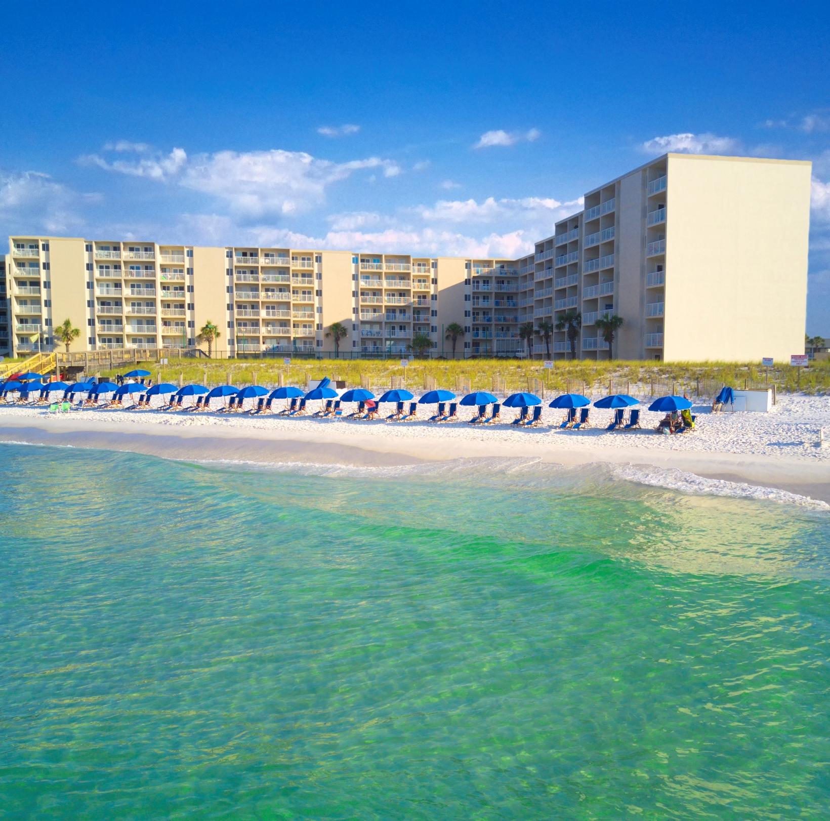 Take in the beautiful emerald green waters from your private balcony in this updated two bedroom, two bath condo located on the pristine Holiday Isle in the heart of Destin. Granite in the kitchen, updated furnishings and tile in the main living quarters. Fitness center, laundry facilities, meeting space, shuffleboard, tennis courts, private beach, nicely appointed lobby, and heated pool. Wifi, water/sewer, cable/internet included in monthly HOA fees. This condo has some of the lowest carrying costs in Destin! Make precious memories on one of the most beautiful beaches in the world in this private gated community in one of the most coveted areas of Destin! All new doors and windows. Has a private washer and dryer in the outside closet. Turn key rental ready.