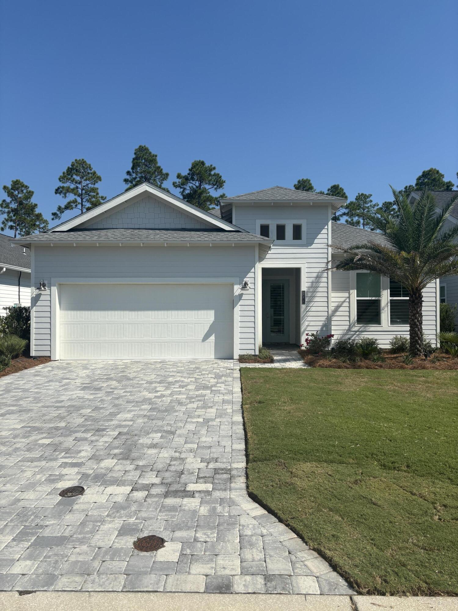 This stunning single-story home in the highly sought-after Watersound Origins community has been thoughtfully upgraded to combine luxury, comfort, and functionality at every turn.Step into your own private retreat, where outdoor living takes center stage. A sparkling heated pool with auto-fill is surrounded by lush new landscaping and secured with an elegant aluminum fence. The custom outdoor kitchen, complete with a Blaze grill and glass-front stainless refrigerator, makes entertaining effortless, while the covered patio with added gutters ensures year-round enjoyment. Inside, the home showcases refined details and timeless upgrades. Venetian plaster graces the foyer and living room ceiling, while upgraded lighting in the kitchen, dining room, and bathrooms adds a touch of sophistication. Plantation shutters provide elegance and privacy throughout, and the garage is finished with durable epoxy flooring for a clean, polished look. For added peace of mind, a whole-house natural gas generator keeps everything running seamlessly.
Watersound Origins offers an unparalleled lifestyle with access to world-class amenities. Residents enjoy the Village Commons pool and fitness center, sports courts, miles of scenic nature trails, unlimited golf, and expansive green spaces. Just outside the gates, the newly developed Watersound Town Center brings convenience and charm with a Publix Super Market, excellent dining, healthcare services, a weekly Farmers Market, and more.
Set in a non-rental community, this home delivers the perfect blend of luxury and convenience in one of South Walton's premier neighborhoods.