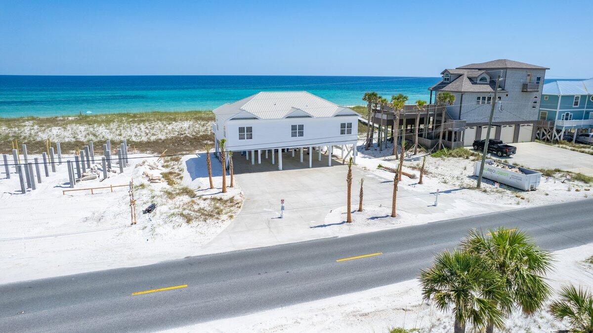 The Best gulf front Home option on Navarre Beach! With aprox 100 feet of frontage, this classic beach house is ready for its next owner. Many recent update in the past year including a new roof make it a turn key option. as sold fully furnished. Currently used as a second home with rental projections in the 150k range should the next owner choose this option. If you have been waiting for a beach house, this should be seen to truly appreciate everything it has to offer.