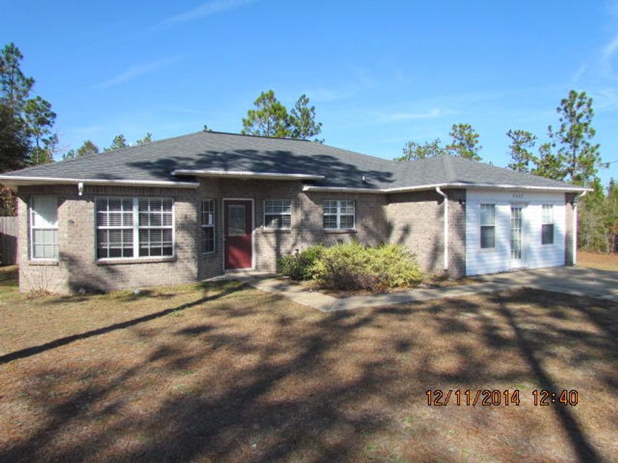 REO listing and a lot of elbow room on this .93 of an acre in Silver Springs Estates on the north end of Crestview. This is a 3 bedroom, 2 bath split bedroom floor plan house. The flooring has been upgraded in the great room. There are vaulted ceilings in the great room as well with a sliding glass door looking out into your expansive back yard. The kitchen offers a lot of cabinet space, counters as well as an island. The garage has been converted and has two windows for lots of light and is air conditioned. The walls are painted in the garage and the floor has been painted. Property being sold 'as is'. Buyer to verify all pertinent information to satisfy themselves.