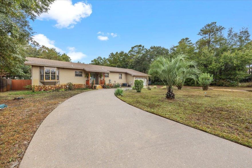 Welcome to 6523 Robar Tesora Street, a charming 3-bedroom, 3-bathroom Navarre home offering comfort, privacy, and a true coastal lifestyle. Set on a spacious 0.41-acre lot, this property features an updated interior, a modern kitchen, and a relaxing backyard oasis complete with an inground pool and gazebo. Located in a quiet, no-HOA neighborhood, you're just minutes from shopping, dining, and the white sands of Navarre Beach. Families will love the convenience of nearby top-rated schools, making this home ideal for anyone seeking both tranquility and accessibility.