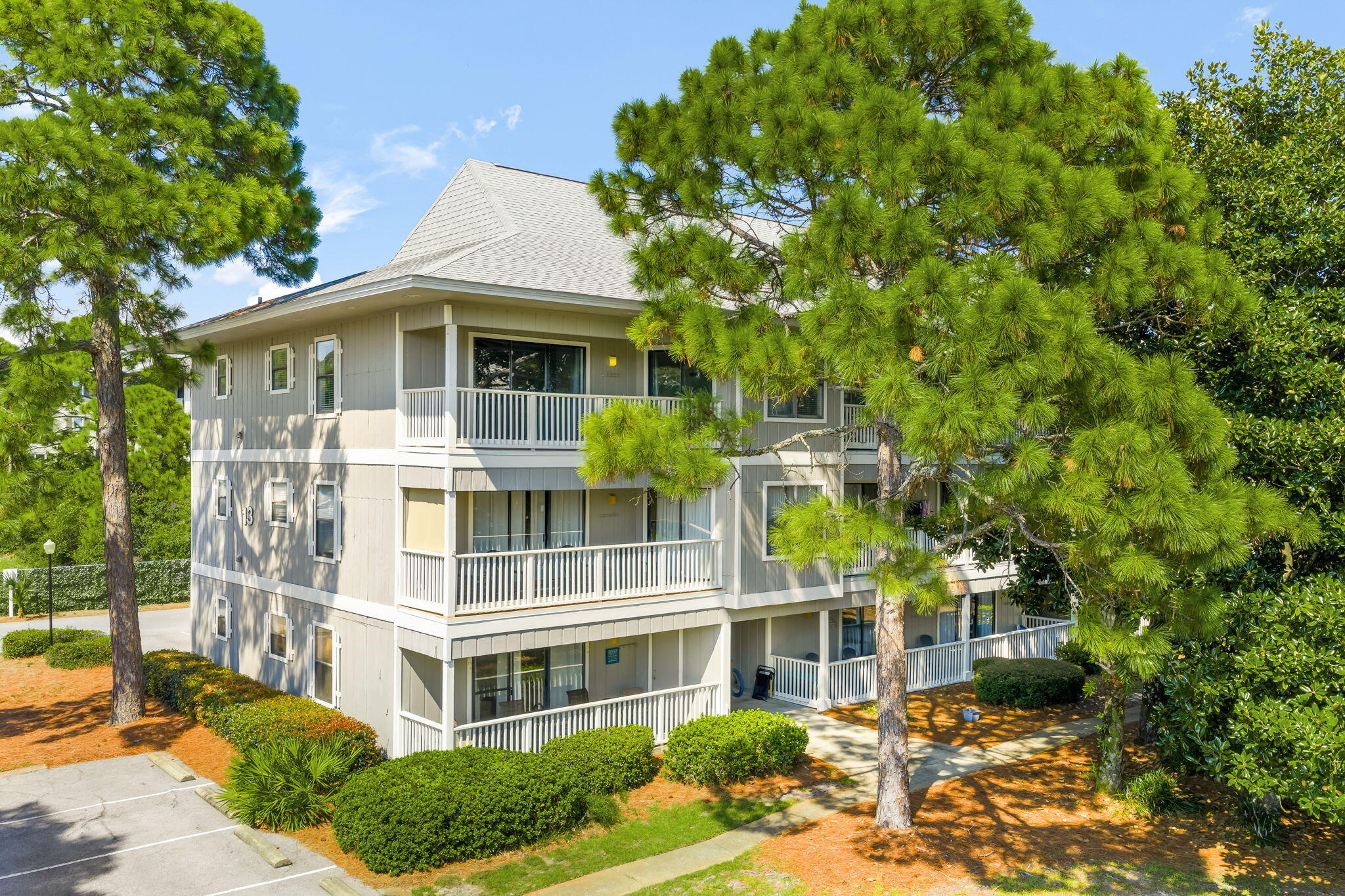 This 3rd floor end unit is private with a spacious covered porch overlooking the pool. This unit also has a separate laundry room inside. Only a 4 minute walk to the beach access just across 30A, quick access to Publix, bike rentals, shopping and dining. Seaside is just to the West minutes by bike or car. Beachwood Villas has lush tropical landscaping, multiple grilling areas, shuffleboard, heated pool, tennis courts.Washer and dryer included. Basic cable, water, sewer and amenities included! A Rental Application Fee of $70 for each applicant will be collected to initiate a credit screening and criminal background check as part of the application evaluation process. Beach Sunsets Inc charges a Tenant fee of $25 per month payable with rent. Renter's Insurance is required; Option available for $11.95 per month. Pet Security Deposits are $500 PER PET and refundable if there is no damage at lease end. Pet Rent is $25 PER PET per month. At lease execution, security deposit(s), pet security deposit(s), and any lease required prepaid rent are due and payable. Your first rent payment is made the day you move in and due the 1st to 5th of each month thereafter.