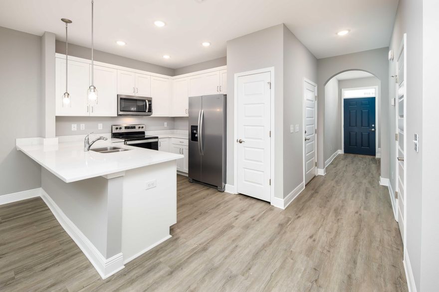 Brand NEW townhomes for sale in the heart of Fort Walton Beach! Orange Place offers 26 units in total, each with 3 bedrooms/ 2.5 bathrooms with an individual garage. This is Unit 319-17, which is the ninth unit on your right. Downstairs you will find the living room, half bathroom, and a contemporary kitchen complete with Bianco Carrera Quartz countertops, soft close cabinets, and stainless steel appliances including a fingerprint resistant stainless steel side by side refrigerator. You will find LVP throughout the living and bathrooms, and plush carpet for comfort in the bedrooms. You are only a short drive away from the beaches, shopping, restaurants, Air Force Bases and more. Make an appointment to come see a unit today!