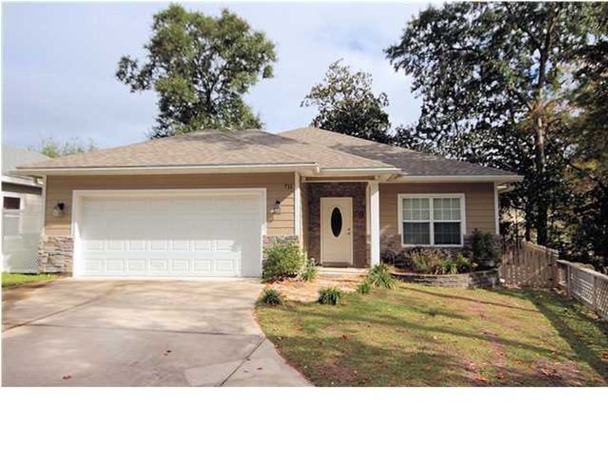 DARE TO COMPARE! This home has all the bells & whistles you come to expect in higher priced homes. Ideal open floor plan, gourmet kitchen with granite & stainless steel appliances, spacious bedrooms, master suite fit for a king & queen and a 2 car garage are just a few of the features of this great family home. Kids will enjoy the large lot (total of 3 lots! dimensions not included in lot size) which includes their own woods to explore. Home located at end of dead end street for added privacy. Call today to schedule a viewing of this fine home.