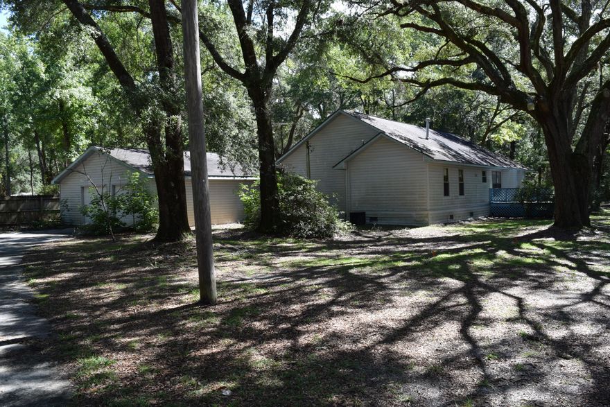 Interesting property on a huge corner lot, nestled up close to Black Creek where the fishing is bountiful. This is much more than a manufactured home having expansive additions which include a large sunken living room with a fireplace, a large master suite, an awesome sun room that would be great for entertaining, and a way over sized two car garage. Bring your RV, your boats, trucks and cars and you will still be challenged to fill up the huge driveway! All this space is here to enjoy and all about 20 minutes from the beaches of S. Walton and about the same distance to I-10 which, of course, gives you cross country access. This property is also strategically located between the region's two most used airports