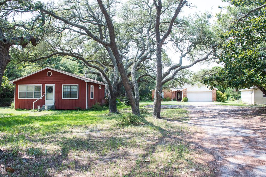 Unique Opportunity to own an old Destin homestead on a large .76 acre High & Dry lot with 2 homes on site. The front house was built in 1945 and is 3-bed/2-bath & 1080 sq/ft, bringing in rental income of $925 a month. The Main house was buit in 1995 measuring in at 1620 sq/ft. with 3-bed/2-bath, 2 car garage and covered back porch. There is a storage / well house on property. This area has been rezoned ROI-GD allowing for single family, multi family, or multiple commercial uses including but not limited to specific retail uses (books, clothes, music, florist, office supplies), real estate services, finance or insurance, janitorial, educational, hospital, day care, nursing care, religious, ambulatory, veterinary, janitorial, laundry, pet care. Full ROI-GD sheet attached in Documents