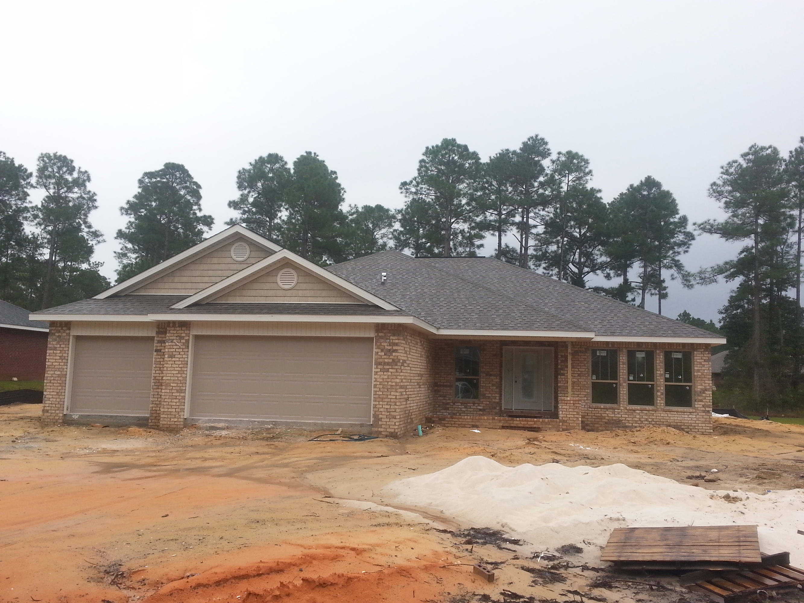 Searching for a spacious and open lay-out in the main living areas? You may want to look at our new home design. Upon entering our Port Royal III you are greeted with a truly open plan with 10' ceilings in main living area. The formal dining area, family room, and spacious kitchen all flow together nicely. There is an office/living room with triple windows for lots of natural lighting. The kitchen has plenty of cabinets for storage, an island sink with a table extension that will have granite like the rest of the kitchen counter tops. This area is perfect for extra seating for entertaining or a great place to do homework or baking. The kitchen offers stainless appliances and includes double wall ovens. There will be plenty of lighting in the kitchen and includes.....(more)...