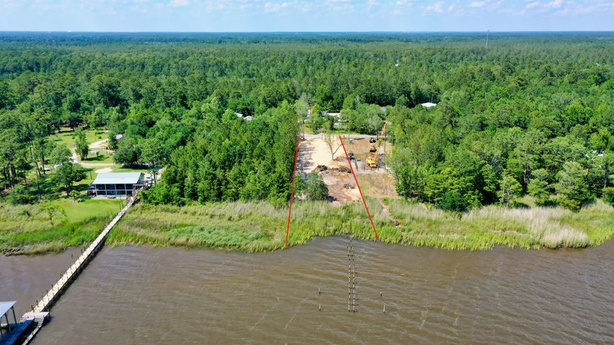 PRICED TO SELL! WILL NOT LAST AT THIS PRICE! Stunning bay front lot with gorgeous moss draped live oak trees leading to the property. Water tap is installed on the property! Beautiful sunsets at the mouth of the Choctawhatchee river perfect for fresh and salt water fishing.Deep water slip close to the 331 bridge and public boat launch. Cruise across the bay to The Bay restaurant or over to Baytowne Wharf for dinner. The neighborhood has an old coastal Florida vibe with a public dock. One of the few deep lots with a deep water slip in Freeport located on a dead end road with no HOA. Perfect location within minutes to 30a.