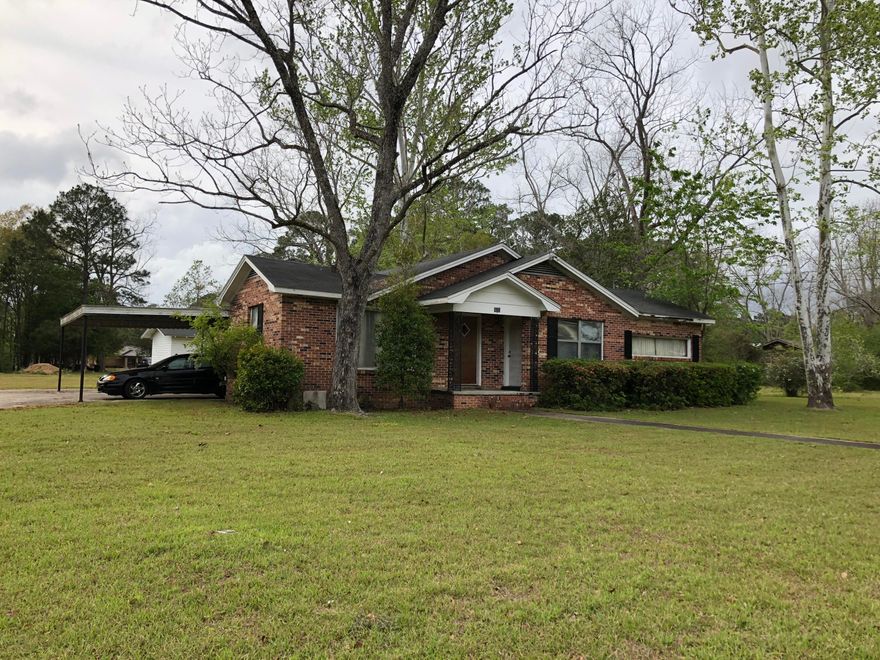 INVESTMENT OPPORTUNITY: This 3 bedroom 1.5 bath brick home features large kitchen, living room, family room, and dining room. Home would make an ideal rental property for an investor or a perfect starter home with a little TLC. Property is in need of some repair but has a lot of potential. The outdoor enthusiast will love the spacious yard as home is situated on 4 lots within the city limits. Home is being sold ''AS IS'' - 24 hour notice required for showings. Please do not go on property without an appointment. PRICED TO SELL - CALL TODAY - DON'T MISS OUT