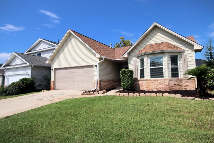 ***Seller Offering $8,000.00  Closing Cost Concession to BUYER with Acceptable Offer for BUYER Closing Costs or Rate Buy Down***WELCOME HOME! Now interviewing New Owners for this CHARMING 3 Bedroom, 2 Bathroom with 2 Car Garage!  Situated 3.5 Miles west of Hurlburt Field making this property a PRIME location! Freshly Painted throughout, New Carpet, New Microwave, New Lawn Timer, New Outdoor Lighting, New Vinyl Siding on Patio and Rear Fireplace exterior, New Toilets, 1 year old Refrigerator, HVAC serviced and overall updating throughout to include Garage and Patio newly painted floors.New Roof in 2021 as well as New LVP (Luxury Vinyl Plank) Flooring installed at that time.  The Open Concept layout enhances the sense of space and allows for versatile furniture arrangements.  Great Room has Fireplace with Gas Log, separate Dining Area, Kitchen with Breakfast Nook, breakfast bar and sliding door out to covered patio and privacy fenced back yard. Primary Bedroom is light and airy with a large bay window and Large Walk-in Closet. Located on Cul-de-sac with no through traffic. Don't miss this ONE!