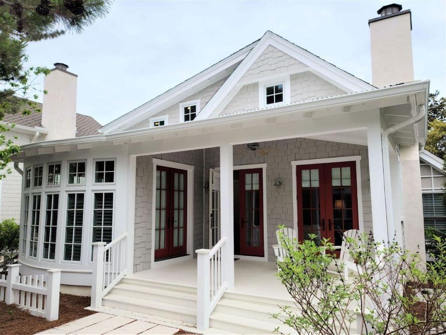 This charming cottage is only a short walk away from the beach, the pool and the gym. It is tastefully furnished and would make the perfect vacation retreat or vacation rental. The home offers a covered front porch perfect for relaxing in the shade and enjoying a good book and a side patio for grilling.  As you enter the home you are greeted by the open living, dining and kitchen areas. There are plenty of windows throughout giving natural light. The spacious laundry room includes extra cabinetry for storage and countertop space. Completing the main home is the guest bedroom, full bath and the master in-suite complete with clawfoot tub. Other finishes include Viking appliances, custom cabinetry, raised ceilings, extensive millwork and wood floors.   In addition, you will find a fully-