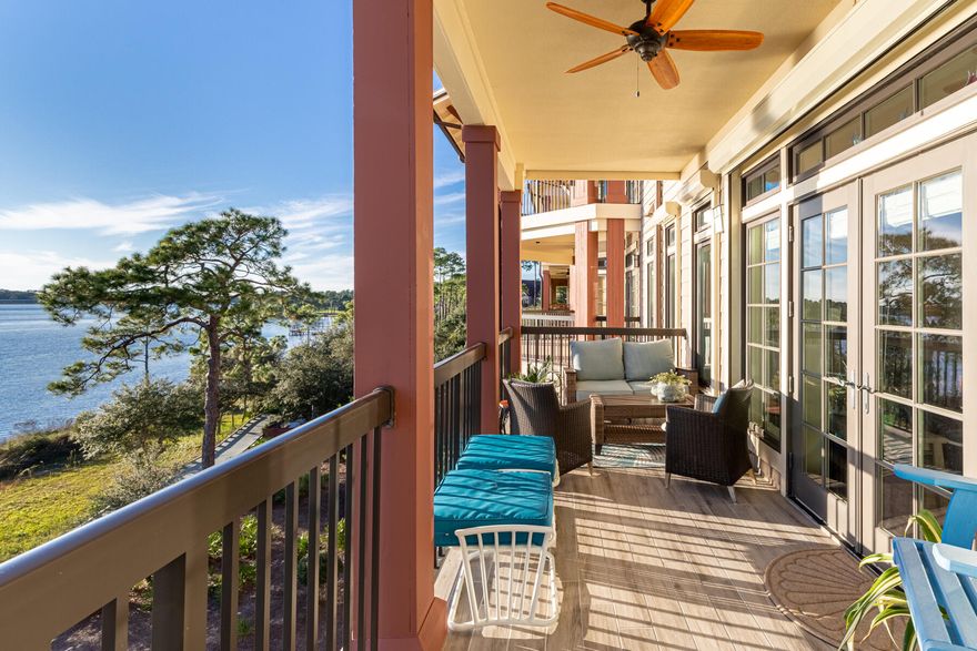 Stunning views of Lake Powell and onward to the  Gulf of Mexico await you at this gorgeous condo in the premier community of Wild Heron.  This light filled home has numerous upgrades and updates including kitchen remodel, beautiful tile throughout, storm shutters, and custom built ins.  The open floor plan lets the light flood in and the views are incredible from living, dining, kitchen and master bedroom.  Wild Heron is an amenity rich community offering golf, tennis, boat house, pool and hot tub.  Spanning over 734 acres and 13,500 waterfront feet on a rare coastal dune lake only 600 residences will share this exquisite property and active lifestyle.