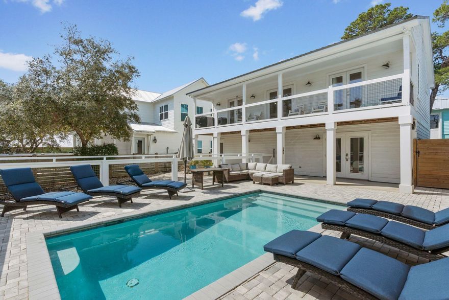 Located south of 30A in the highly sought-after Eastern Lake neighborhood of Seagrove, Storms by the Sea is a beautifully renovated retreat offering modern comforts, a private pool and effortless access to the beach. This four-bedroom, three-bathroom home has been thoughtfully updated, making it ideal as a vacation rental, second home or full-time residence. Situated on a spacious .17-acre lot, this home boasts a prime location with easy beach access by bike or golf cart.The first level features three well-appointed bedrooms, including a king suite with patio doors opening to the pool deck. A separate bonus living space on this level provides a relaxed area for entertainment, a game room or a teen hangout. Two additional guest rooms--one with a queen bed and the other with a fullshare a stylishly updated hallway bathroom. The private heated pool is surrounded by ample patio seating for 12 guests, creating the perfect space for outdoor gatherings.

Upstairs, the main living area is bright and open, with an expansive kitchen that includes quartz countertops, stainless steel appliances, and an oversized island with seating for four. The adjacent dining area offers seating for six more, while the living room provides a comfortable space to relax with its coastal d??cor and large flat-screen TV. A second master suite is also located on this level, complete with a private bath and direct access to the second-story deck, where lounge chairs invite you to enjoy gulf breezes.

This home is designed for both luxury and convenience, featuring stylish lighting and custom finishes. Recent updates include fresh interior and exterior paint, enhanced outdoor spaces and expanded parking to accommodate multiple vehicles. With no HOA restrictions, a walk or bike ride to the beach, and close proximity to local dining favorites like Florida Fish House and Steamboat Grill, Storms by the Sea offers an unparalleled 30A lifestyle. Whether you're looking for an investment property, a serene coastal getaway or a forever home by the beach, this exquisite retreat checks every box.