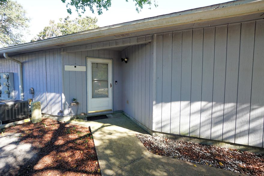 Come see this wonderful townhome in the heart of West Destin! No HOA! With 2 bedrooms and 1.5 bathrooms, it is the ideal set up for a variety of arrangements. Use for primary residence, vacation home or investment. It is close to Harbor Walk Village, the Destin Executive Airport and Big Kahuna's Water Park. Being the end unit--it has a larger backyard than most units and is single story (no stairs to climb). The large kitchen has ample counter space and is open to the living area. There is a laundry room off of the kitchen--so no more trips to the laundromat! Roof 2016; HVAC and Water Heater 2021.  (No short-term rentals.)