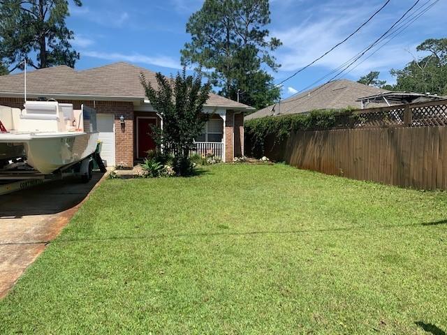 Centrally located in Niceville - just minutes to Eglin's east gate. Great floor plan, features split bedrooms, kitchen , dinning open living area. Cathedral ceilings in the great room and 9 ft ceilings throughout. The breakfast bar over looks the great room, makes this open floorplan great for entertaining. The kitchen is well designed with plenty of cabinetry, counter space, pantry. The master bedroom suite features a large master bathroom with walk-in closet and twin vanities. Screened patio, Large yard with above ground pool and custom decking and gazebo area to entertain. Sprinkler system to keep your lawn looking good.