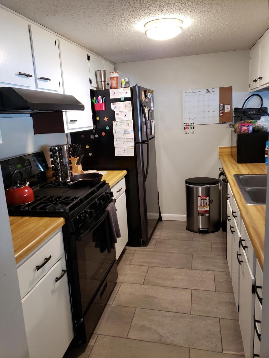 Lakefront Townhome features 2 spacious bedrooms and 2 1/2 baths. Tile throughout main living areas and carpet upstairs. The galley kitchen opens into the family room/Dining Room Combination. You will find the renovated half bath on the first floor as well. Large laundry room comes with shelves and a storage area. Sliding glass doors lead out to the lake. Upstairs you will find the bedrooms along with the 2 full baths. One of the bedrooms even has a lake view. Make your appointment today!