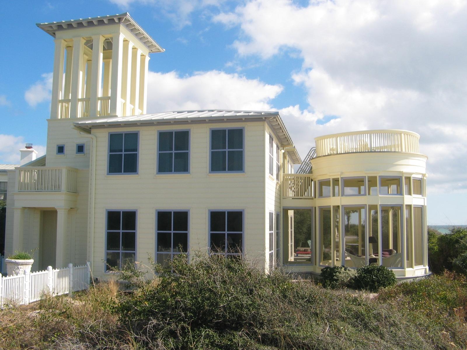 Secluded,gulf front lot eastern border Seaside, twice width of other gulf front lots in Seaside, 140' on gulf, 105' deep. One-of-a-kind design by Charles Warren, featured in several publications. Iconic Tupelo Pavilion adjacent to front door walk. Sand play area for children. Living & dining include columns & coffered ceilings & surrounded by floor-to-ceiling windows. Fireplaces in dining & master. Kitchen recently updated, Dacor gas stove, KitchenAid refrigerator, dishwasker, ice maker & microwave. Breakfast nook & bar. Ash & Maple floors. Mackenzie-Childs tiles in master & half baths. 2nd level open porch has unobstructed gulf views. Master, guest bedroom & tower w/gulf views. Windows & doors meet current code, standing seem metal roof, cedar siding, alarm, 2-car carport