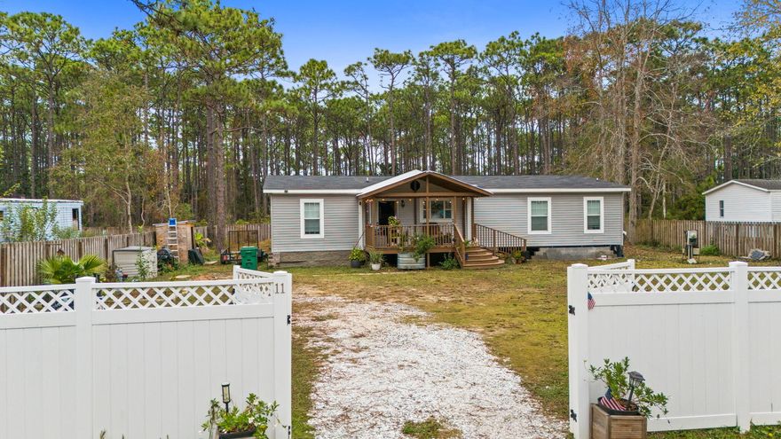 Location, location! Minutes from the west end of 30A and iconic Grayton Beach, this beautifully maintained 2022 3BR/2BA manufactured home offers relaxed coastal living with a 7-year transferable warranty. A bonus area provides a perfect spot for a compact office or flex space, while the primary suite features a private en-suite bath. The modern kitchen with a large peninsula opens to bright living spaces. Enjoy front and back patios and a fully fenced 0.34-acre lot offering privacy, room for pets, or future expansion. Located in desirable Hewett Bayou with no HOA and short-term rentals allowed, this home provides strong income potential and convenient access to beaches, dining, shopping, and great schools. Ideal for easy coastal living now.