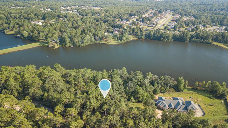 WATERFRONT LOT located on in north Crestview! Bring your house plans and get ready for beautiful sunsets overlooking the water. Perfect spot for your new home!Survey available.