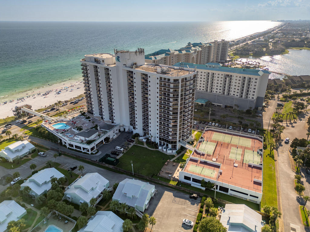 11125 Scenic Gulf Drive, Unit 501 & 501A, Miramar Beach, FL 32550Destin Surfside Condominium | Gulf-Front | Mid-Floor Corner UnitMid-floor 3-bedroom, 3-bath Gulf-front corner condominium with two separate living quarters. Features include Gulf views from multiple rooms, a kitchen with stainless steel appliances, updated bathrooms, custom furnishings, and fixtures. Floor-to-ceiling glass doors and windows provide natural light and access to balconies overlooking the Gulf.Community amenities include a Gulf-front restaurant and bar, on-site spa, fitness center, sauna, heated pool, kiddie pool, two hot tubs, tennis and basketball courts, and an event space with kitchen. Located on Scenic Gulf Drive in Miramar Beach, with proximity to dining, shopping, and entertainment. Short-term rentals permitted. Buyer to verify all dimensions and information deemed important.