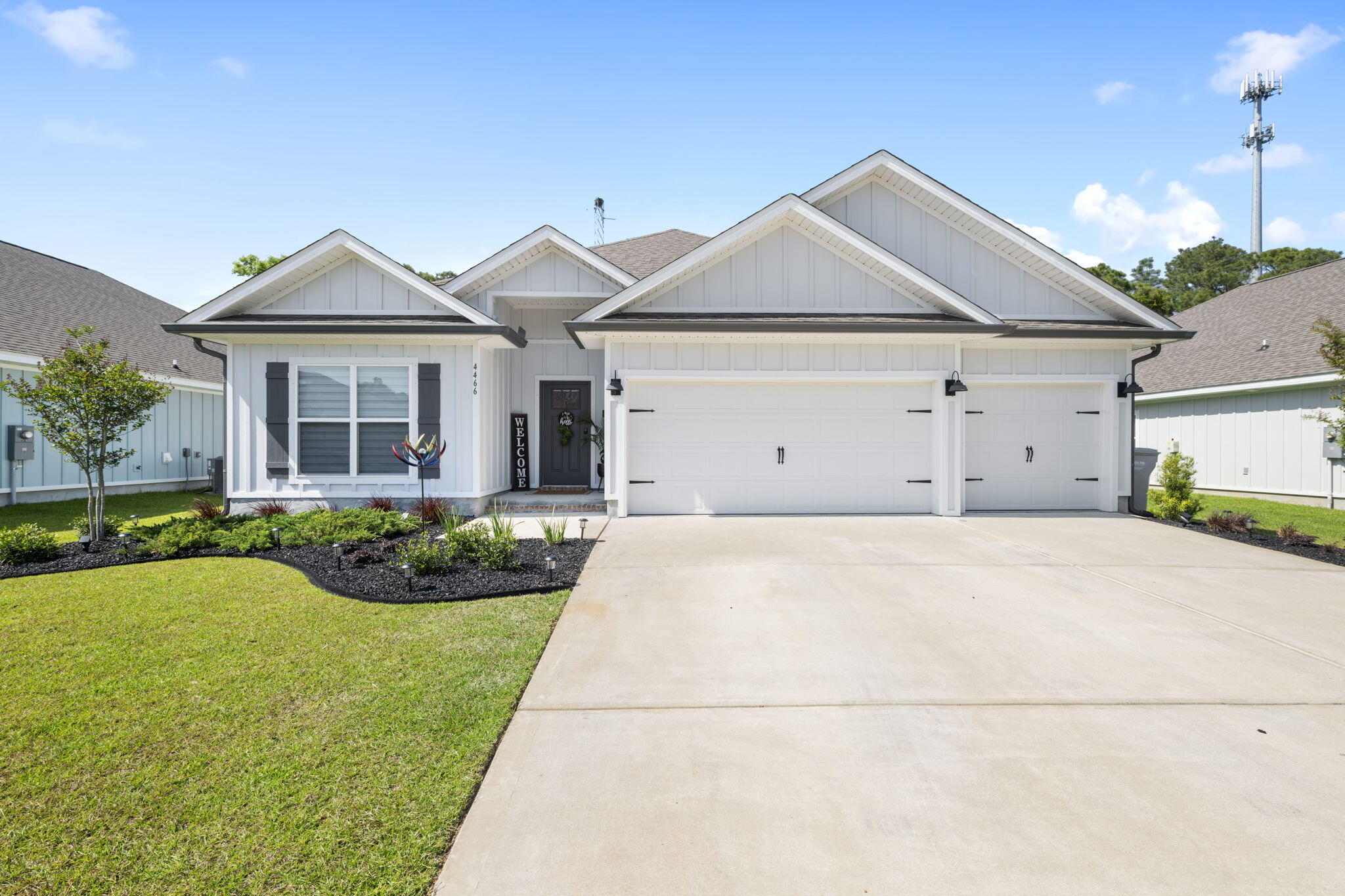 Everything you need in this pristine condition 2022 build! This beautifully crafted 4 bedroom, 3 bathroom home boasts 2,304 square feet of open-concept, modern living space. With a gourmet kitchen that flows seamlessly into the dining and living rooms, the possibilities for hosting gatherings are endless! Enjoy the privacy of the primary suite, which includes a garden tub, double vanities, separate shower, and walk-in closet. The beautifully manicured exterior includes two patios in the fully fenced-in backyard, perfect for entertaining, grilling, relaxing, and more. Other amenities include:3 car garageGranite countertopsStainless steel appliancesCenter island in kitchenWalk-in pantryUpgraded oil-rubbed bronze fixturesFabric hurricane protection  gutters, additional back patio, and oil brushed bronze hardware, ceiling fans, light fixtures and faucets throughout the home. Located minutes from the beach, top-rated schools, and shopping, this home offers both comfort and convenience in one of Gulf Breeze's most desirable neighborhoods.