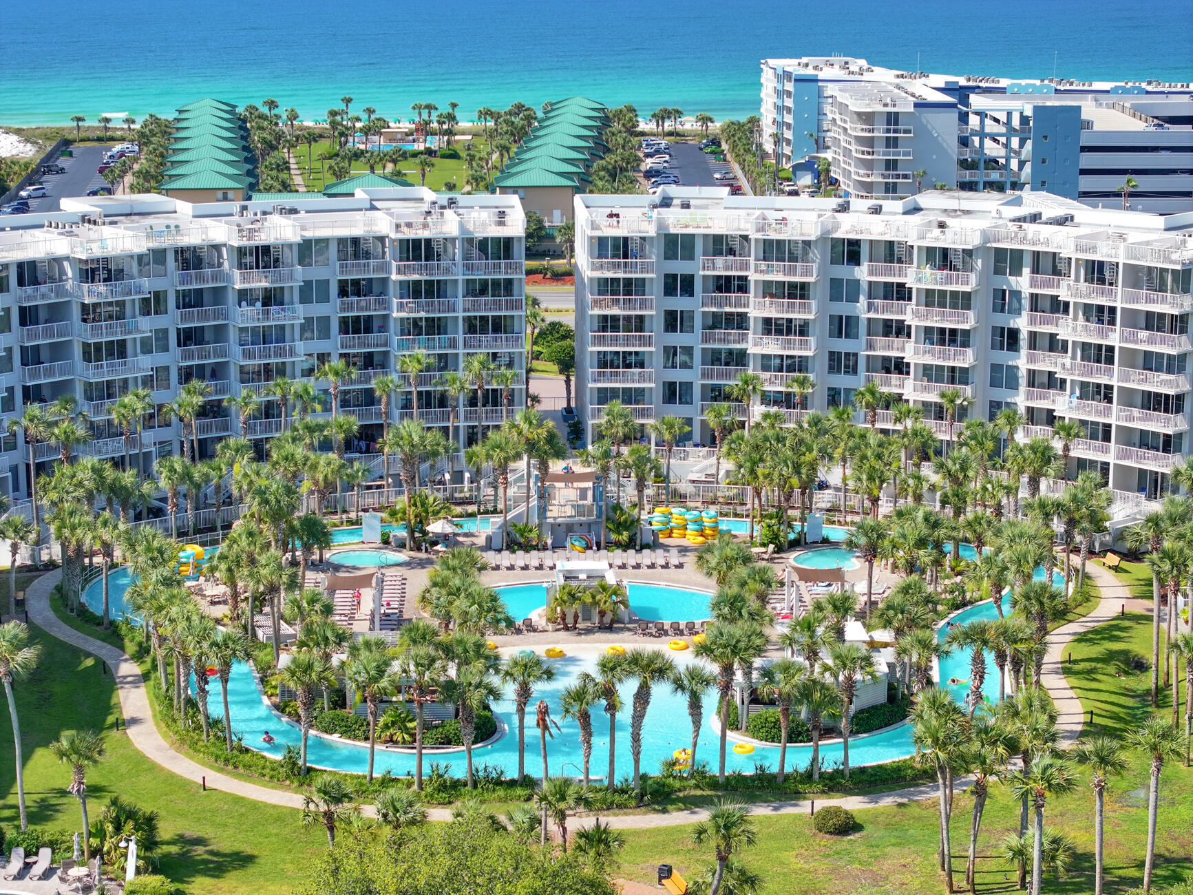 Enjoy the views of the Choctawhatchee Bay, the lazy river pool and the tropical landscape all while soaking in your very own private hot tub on this ground floor unit on Okaloosa Islands most sought after property Heron at Destin West Beach and Bay Resort. This complex has a walk way over to the beach and Gulf of Mexico giving you easy access to the beaches as well as bay. This three bedroom 2 bath unit sleeps 8 and comes fully furnished.The best part is this first floor unit has a great patio to watch the sunset! The deck below the patio has your own hot tub and gas grill. You have great access to all pools on the property. The modern kitchen features stainless steel appliances, granite counter tops and tons of counter space for your cooking and entertaining needs. A large dining table seats six of the kitchen as well as a breakfast bar for extra seating. The living room with floor to ceiling glass to enjoy your beautiful view features a large sleeper sofa as well as a 70" TV for the family to enjoy.
You will enjoy 3 bedrooms featuring a king bed, queen bed and another queen bed with twin bunks in the room for the kids.
There is so much more to this gorgeous unit, but the views, amenities and access to the beach and gulf makes this a fantstatic rental or 2nd home.
There is an assumable VA loan as well at 2.5%. Call for more details.
Buyer to verify all dimensions*