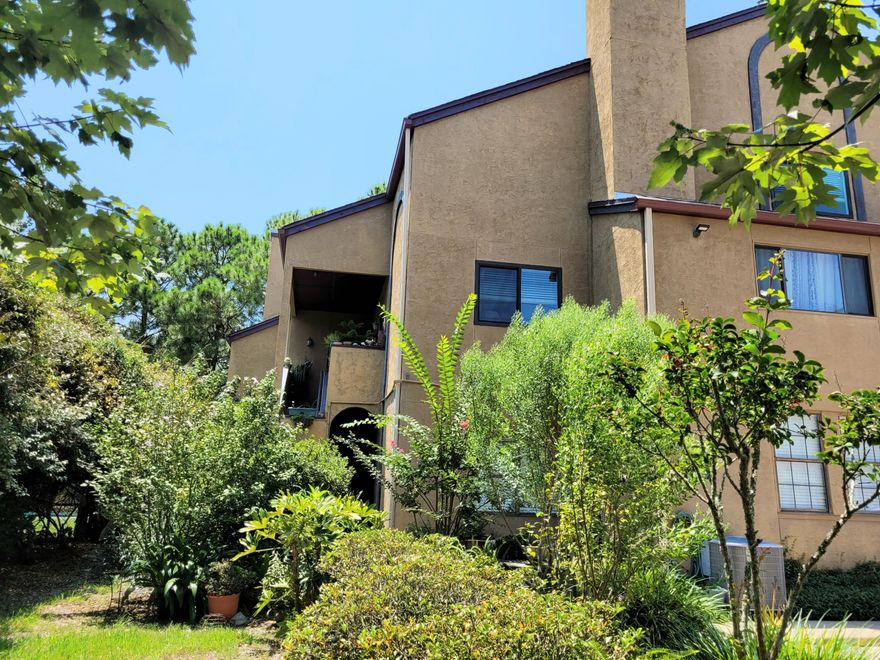 Calling all investors, this is the least expensive property currently for sale in Destin and already has a super tenant in place.  Great ground floor unit is located across the street from Choctawhatchee Bay on a quiet residential street.  The open floor plan lives larger than square footage indicates.  Tile flooring throughout with vinyl plank in the bedroom for easy clean up.  Kitchen offers a breakfast bar plus good cabinet and counter space.  All appliances convey with the unit including the stack washer and dryer.  Large living room and bedroom with access to sun room and storage closet.   Community in-ground pool is located at the rear of the building.  Don't miss out on the opportunity to own this very nice unit in the heart of Destin.  It will not last long at this price.