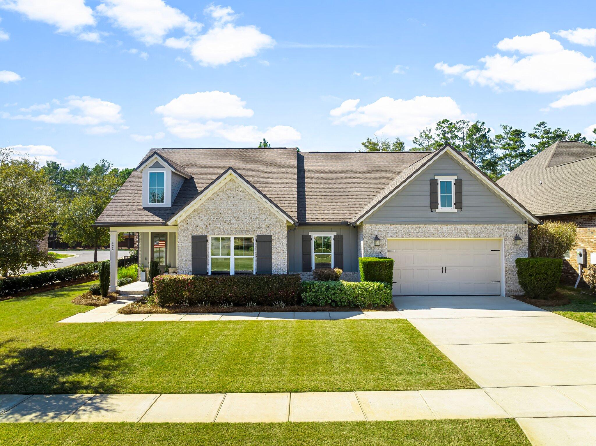 Discover this beautifully upgraded 4-bedroom, 2-bathroom home, built in 2019 by the esteemed Randy Wise Homes. Nestled on one of the best lots in Meadows of Hammock Bay, this home offers 2,045 square feet of thoughtfully designed living space with high-end finishes and extensive recent enhancements--making it truly move-in ready!  Step inside to an inviting open floor plan, where natural light pours in through large windows, accentuating the home's craftsman-style details. The front bedroom--perfect as a bedroom, home office, playroom, or guest space--features updated paint, moldings, and a newly installed door for added privacy. The chef's kitchen is a showstopper, boasting white quartz countertops, custom cabinetry with deep pan drawers, a stylish gray island, and a farmhouse sink overlooking the backyard. High-end Frigidaire stainless steel appliances include a 5-burner gas cooktop, convection wall oven, built-in microwave, and oversized refrigerator. A stunning faux brick accent wall in the living room adds warmth and character.

The primary suite is a relaxing retreat with ample space for a king-size bedroom set. The en-suite bath features dual vanities, a tiled walk-in shower, and a large walk-in closet with built-in shelving. Two additional guest bedrooms have been freshly painted and upgraded with new luxury vinyl plank flooring, ensuring both style and durability.

Outdoor living is second to none! The screened back patio has been enhanced with privacy roller shades, an additional paver patio with a built-in fire pit, and a fenced yard. The beautifully landscaped backyard includes two French drains, drip irrigation, and landscape lighting-creating a serene outdoor retreat. Relax in the premium, 7-seater Hot Spring Spa with full-body massaging jets and waterfall! Or take advantage of the 125V outlet in the garage, perfect for a sauna or additional appliances.

Additional upgrades include a GENERAC WHOLE HOME GENERATOR, Rinnai Tankless Water Heater, an outdoor TV outlet, and custom blinds on both the front and back doors. With a private well and sprinkler irrigation system, a radiant heat barrier for energy efficiency, and a security system pre-wire, this home is designed for comfort, convenience, and peace of mind.

Located in the sought-after Hammock Bay community, residents enjoy resort-style amenities including two clubhouses, movie theater, multiple pools, over 10,000 sqft fitness center, nature trails, a dog park, basketball court, tennis court, and pickleball courts, the Hammock Bay General Store, Props Brewery, and the newly opened Hammock Bay Dental Office! Hammock Bay residents also enjoy private dock access, perfect for fishing, kayaking, and paddleboarding at your leisure!

This better-than-new home is move-in ready with all the extras already done for you! Don't miss your chanceto schedule your showing today!