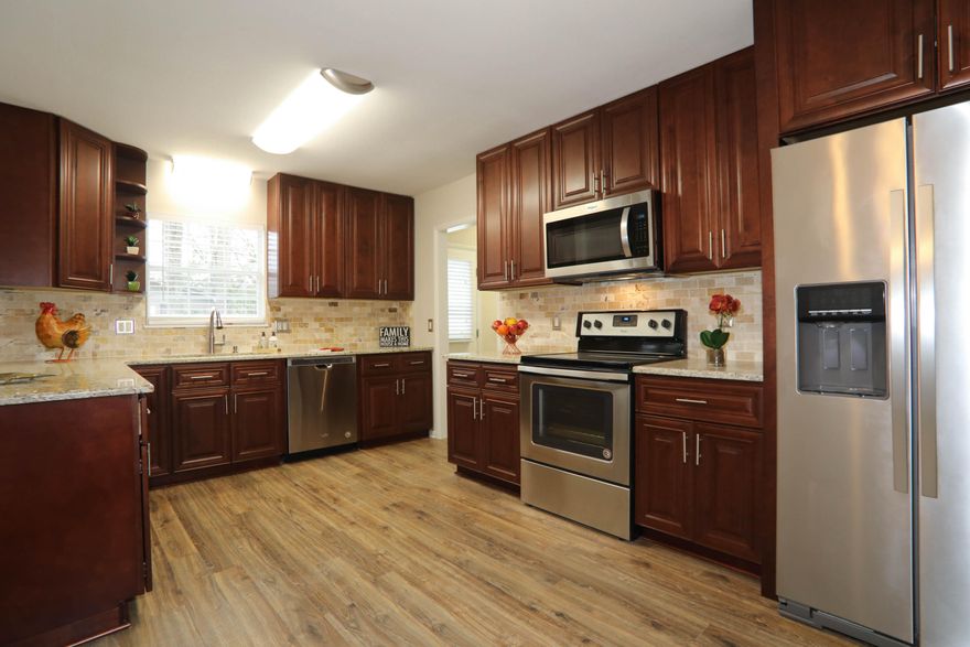 Beautiful, newly updated home in a prime location! So many updates have been done to this home which include: new Kitchen and bathrooms with granite countertops, stainless steel appliances, doors, ceiling fans, light fixtures, high end laminate hardwood flooring, carpeting, luxury vinyl, REDONE pool, and much more. Home is located right next to Choctawhatchee High School and Fort Walton Beach Medical Center, as well as in between Eglin Air Force Base and Hurlburt Field. Buyer to verify room measurements. Shed will be painted.