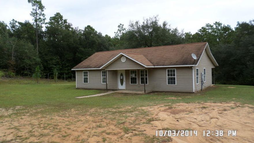 This is a Fannie Mae HomePath Property. Built in 2002, this 3 bedroom 2 bath home has a vaulted ceiling great room, open kitchen with bar top and separate eating area just off the kitchen. Split bedroom design, the laundry room is located indoors and is just off the living room. Master bedroom is large and accommodating for this size home. There is a very large covered patio off the rear of the property that is the width of the home. Home needs repairs and will not qualify for all financing. Located on a clay road. Call today for your showing!